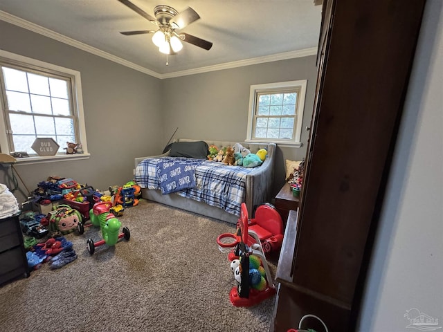 bedroom with ornamental molding, carpet flooring, and ceiling fan