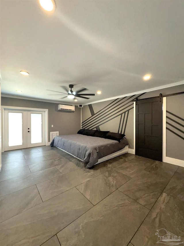 unfurnished bedroom with french doors, a ceiling fan, and a wall mounted AC