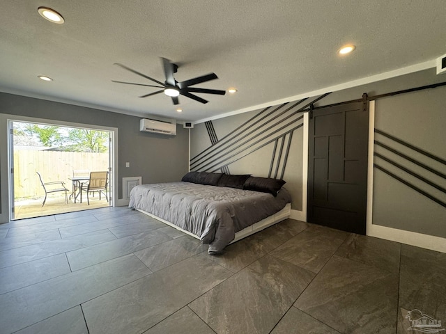 unfurnished bedroom with a textured ceiling, recessed lighting, a barn door, access to exterior, and a wall mounted air conditioner