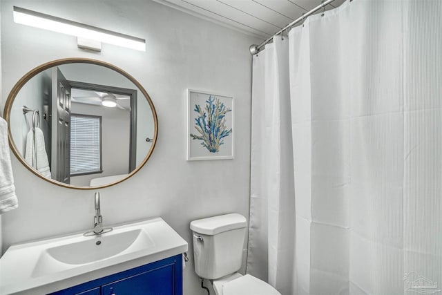 bathroom featuring toilet and vanity