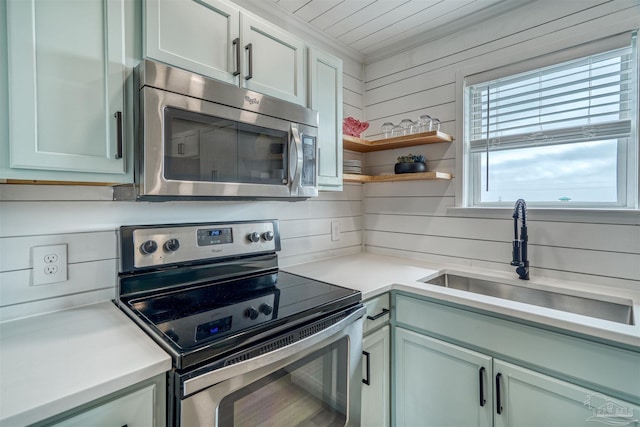 kitchen with appliances with stainless steel finishes and sink