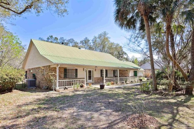 view of front of property featuring central AC unit and covered porch