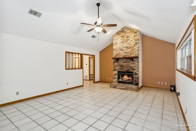 unfurnished living room featuring a brick fireplace, lofted ceiling, ceiling fan, and light tile patterned floors