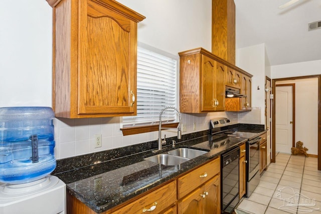 kitchen featuring sink, light tile patterned floors, stainless steel range oven, dishwasher, and decorative backsplash