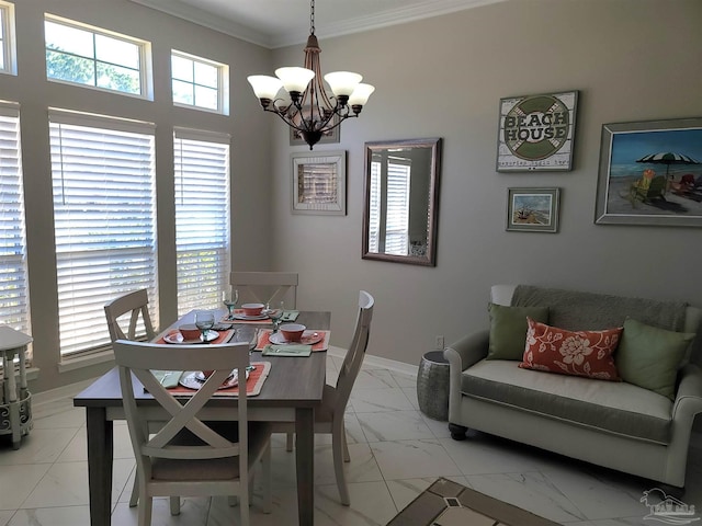 dining area featuring baseboards, marble finish floor, a chandelier, and crown molding