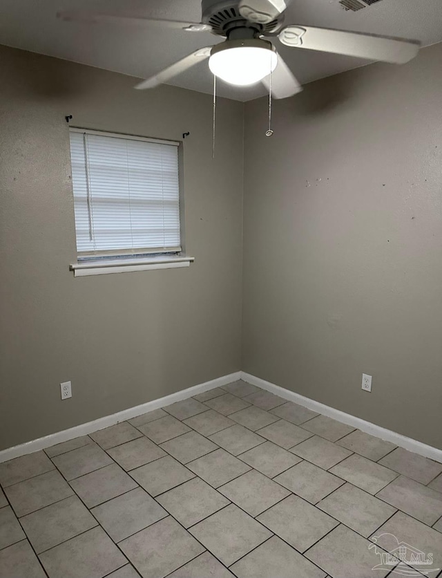 907 Colbert Ave, Pensacola, FL 32507 - unfurnished room with a ceiling fan and light tile patterned floors