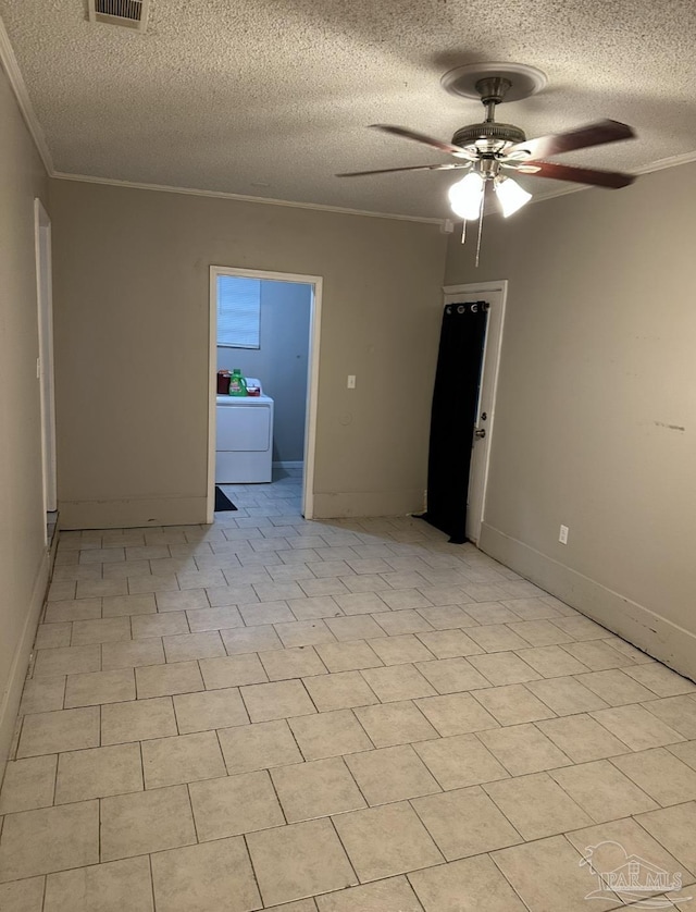 907 Colbert Ave, Pensacola, FL 32507 - spare room featuring a ceiling fan, washer / dryer, a textured ceiling, and crown molding