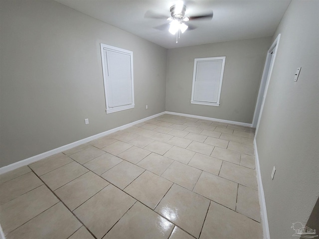 907 Colbert Ave, Pensacola, FL 32507 - empty room featuring light tile patterned flooring and a ceiling fan
