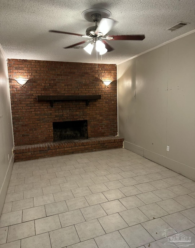 907 Colbert Ave, Pensacola, FL 32507 - unfurnished living room featuring a textured ceiling, ceiling fan, a brick fireplace, and crown molding