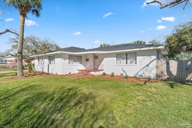 ranch-style house with crawl space, brick siding, and fence