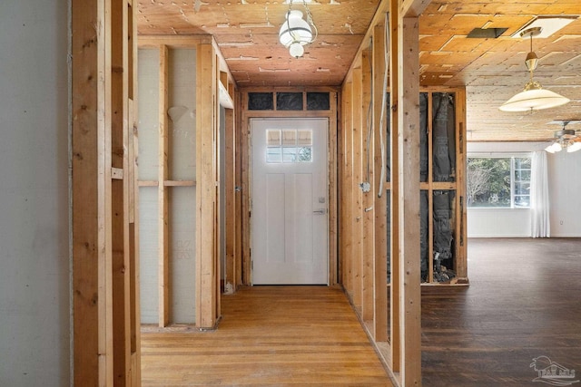 hall with wood finished floors