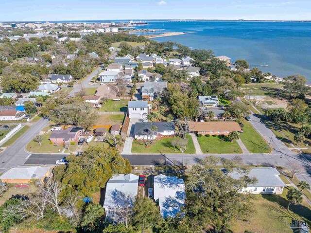 birds eye view of property featuring a residential view and a water view