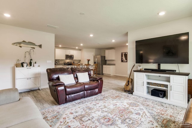 3488 Fallschase Blvd, Pensacola, FL 32526 - living room featuring light wood-style floors, recessed lighting, and baseboards