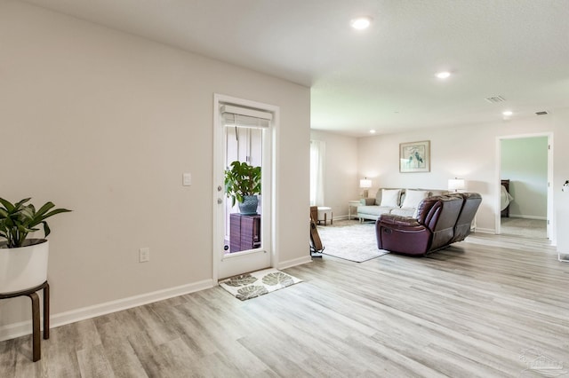3488 Fallschase Blvd, Pensacola, FL 32526 - living room featuring light wood-style flooring, baseboards, and recessed lighting