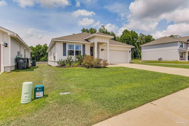 3488 Fallschase Blvd, Pensacola, FL 32526 - view of front of home with concrete driveway, a garage, a front lawn, a shingled roof, and central AC unit