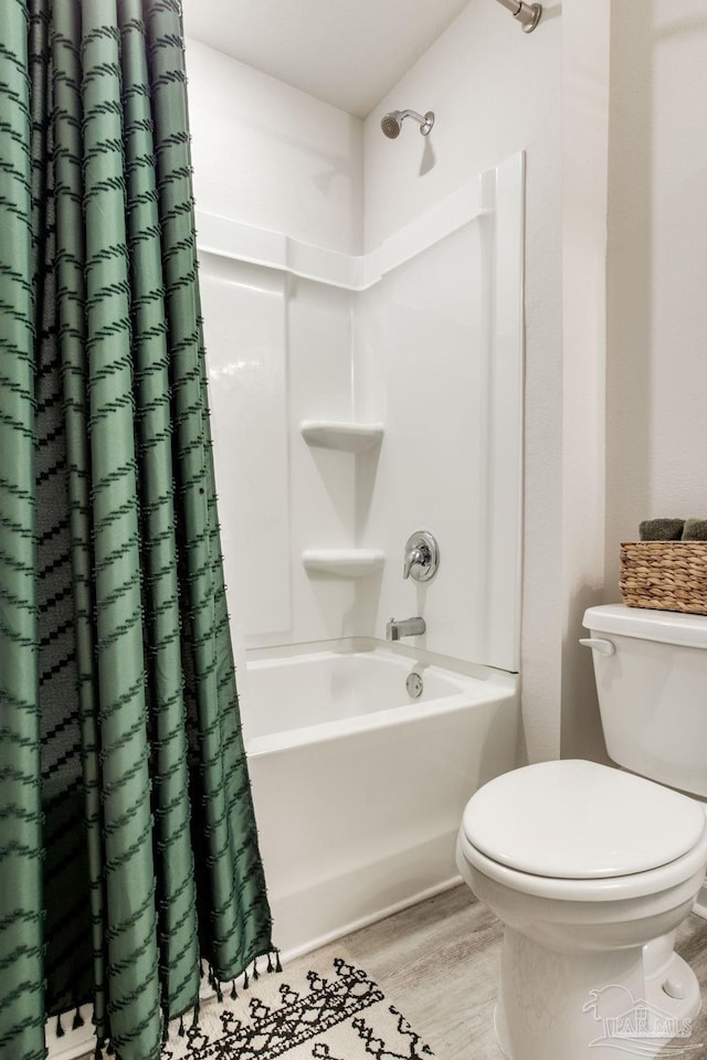 3488 Fallschase Blvd, Pensacola, FL 32526 - full bathroom with toilet, wood finished floors, and shower / bath combination with curtain