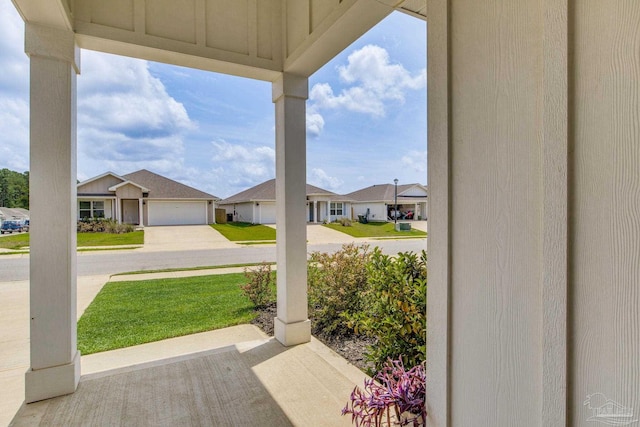 3488 Fallschase Blvd, Pensacola, FL 32526 - porch featuring a residential view and a yard