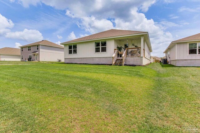 3488 Fallschase Blvd, Pensacola, FL 32526 - rear view of house featuring a yard, central air condition unit, and a porch