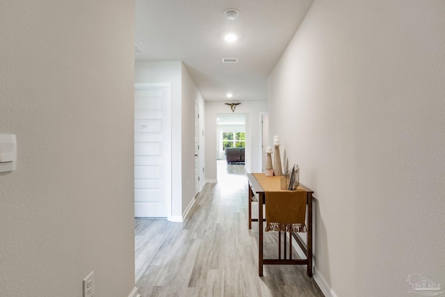 3488 Fallschase Blvd, Pensacola, FL 32526 - hallway featuring light wood-style flooring and baseboards