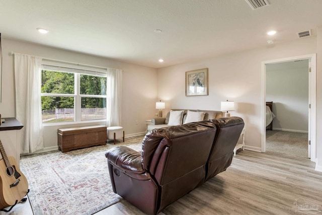 3488 Fallschase Blvd, Pensacola, FL 32526 - living room featuring baseboards, recessed lighting, and light wood-style flooring