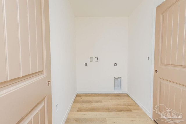 washroom with light wood-style floors, laundry area, electric dryer hookup, and baseboards