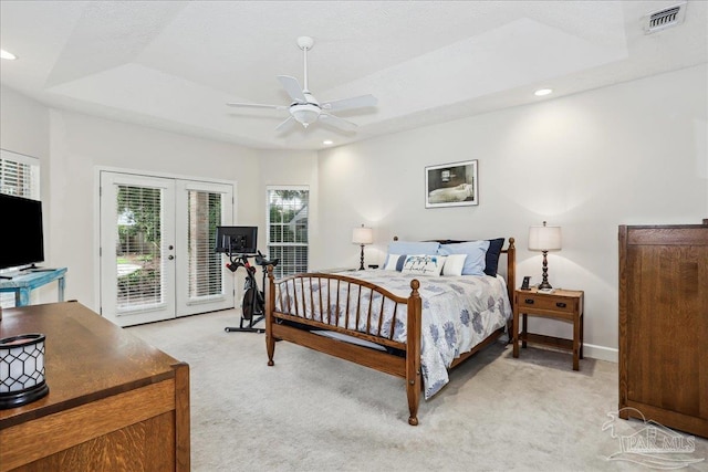2520 Abbie Elizabeth Ct, Gulf Breeze, FL 32563 - bedroom featuring french doors, a tray ceiling, light carpet, access to outside, and a ceiling fan