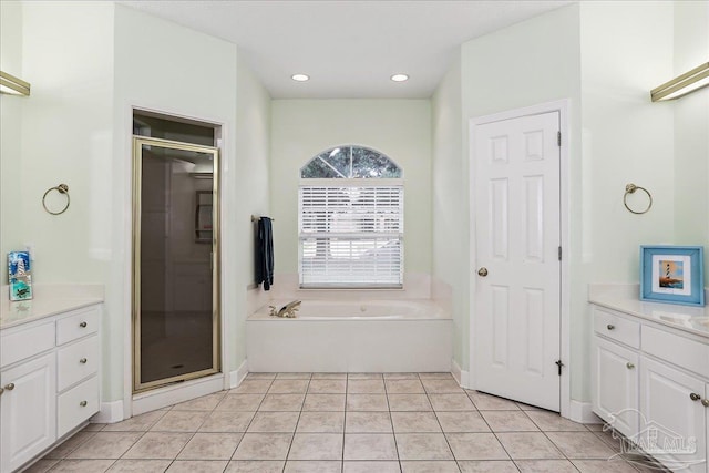 2520 Abbie Elizabeth Ct, Gulf Breeze, FL 32563 - full bath with vanity, a garden tub, a stall shower, tile patterned floors, and recessed lighting