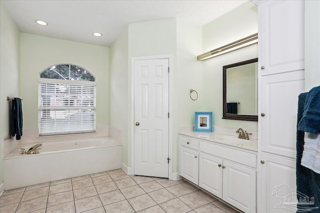 2520 Abbie Elizabeth Ct, Gulf Breeze, FL 32563 - bathroom featuring a bath, vanity, tile patterned flooring, and recessed lighting