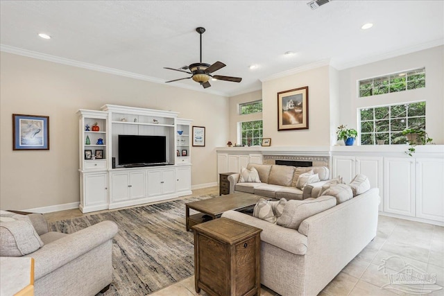 2520 Abbie Elizabeth Ct, Gulf Breeze, FL 32563 - living area featuring a ceiling fan, ornamental molding, recessed lighting, and a fireplace