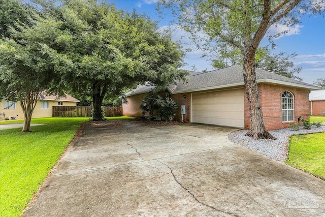 2520 Abbie Elizabeth Ct, Gulf Breeze, FL 32563 - ranch-style house featuring brick siding, concrete driveway, a garage, and roof with shingles