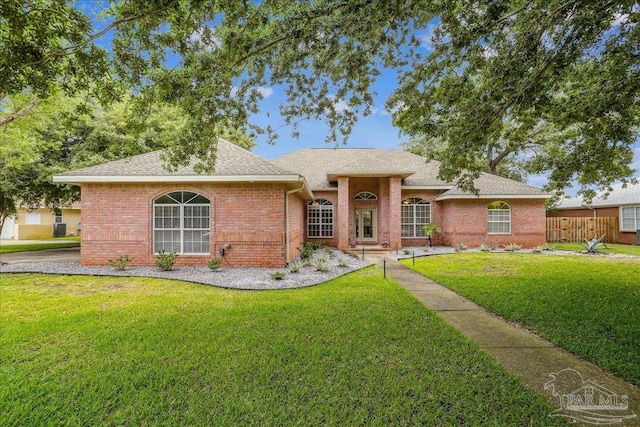 2520 Abbie Elizabeth Ct, Gulf Breeze, FL 32563 - ranch-style home featuring roof with shingles and brick siding