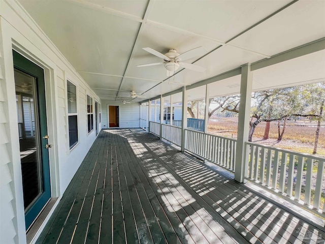 wooden terrace with ceiling fan