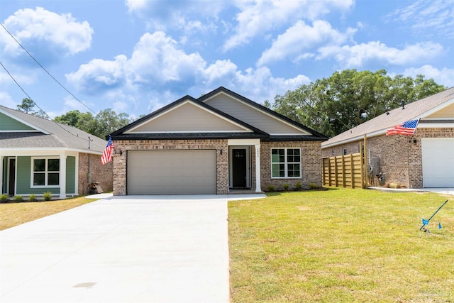 single story home featuring a garage and a front yard