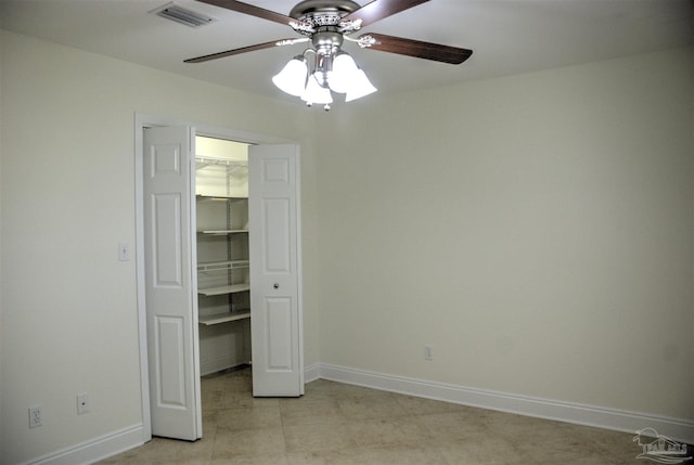 unfurnished bedroom featuring a closet and ceiling fan