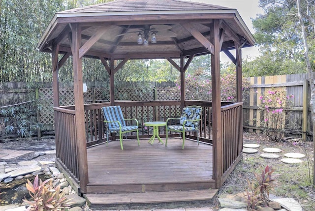 wooden terrace with a gazebo