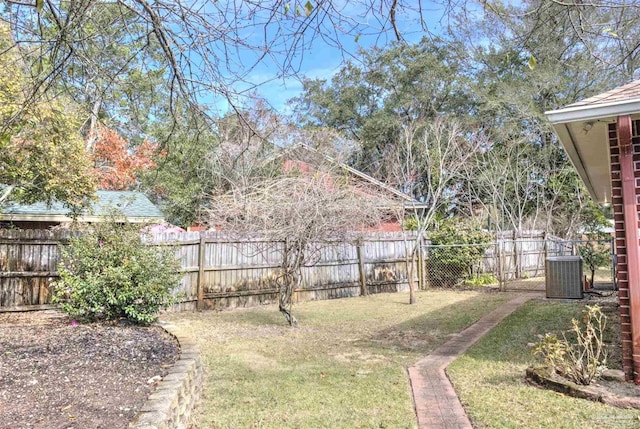 view of yard featuring central AC