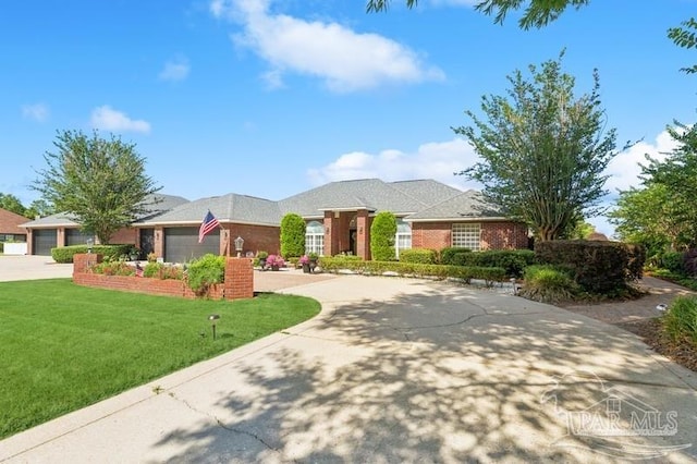 ranch-style house with a garage and a front lawn