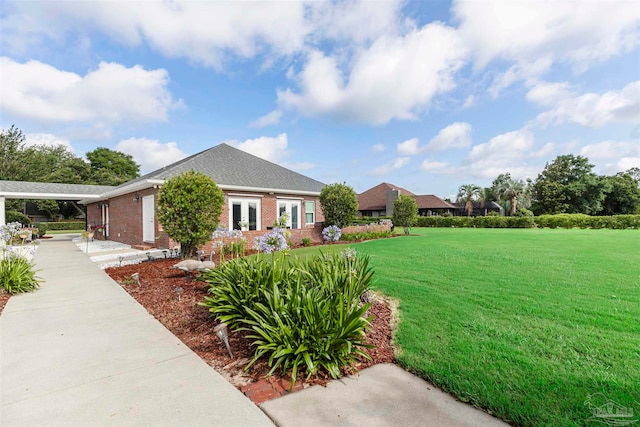 view of property exterior featuring a lawn