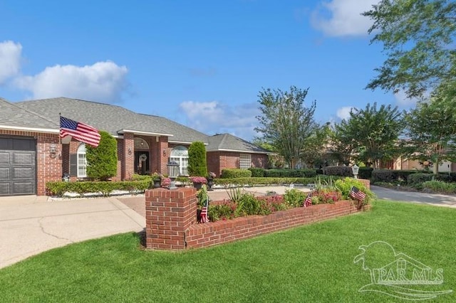 single story home with a garage and a front lawn