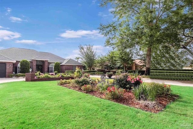 view of yard with a garage