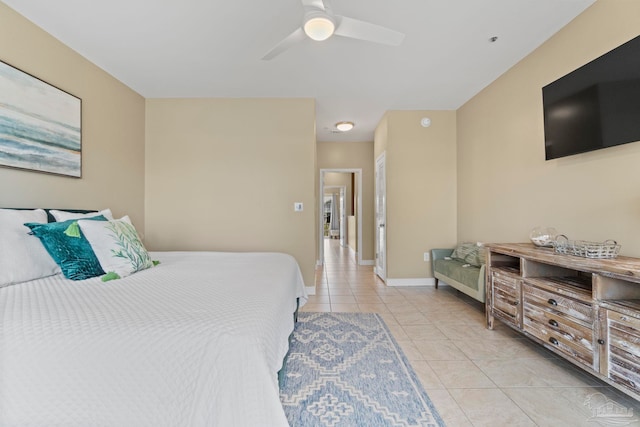 bedroom featuring ceiling fan and light tile patterned floors