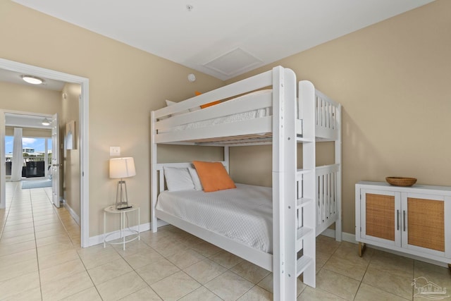 bedroom with light tile patterned flooring