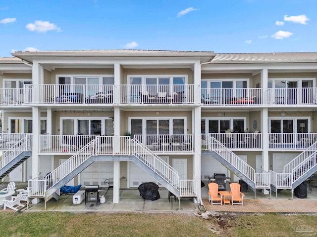 back of property with a patio