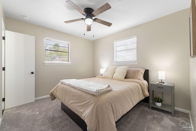 bedroom featuring ceiling fan, baseboards, and carpet flooring