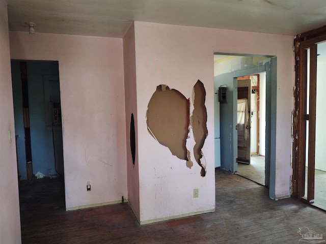 unfurnished room featuring wood finished floors