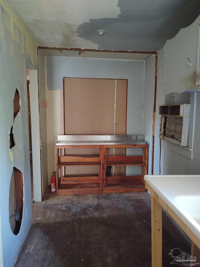 miscellaneous room featuring hardwood / wood-style flooring