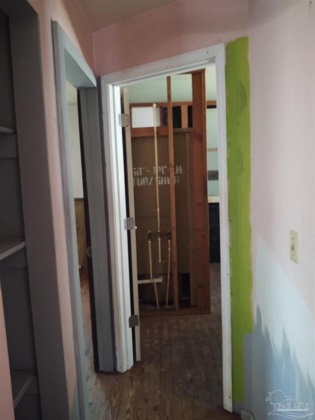 hallway with wood finished floors