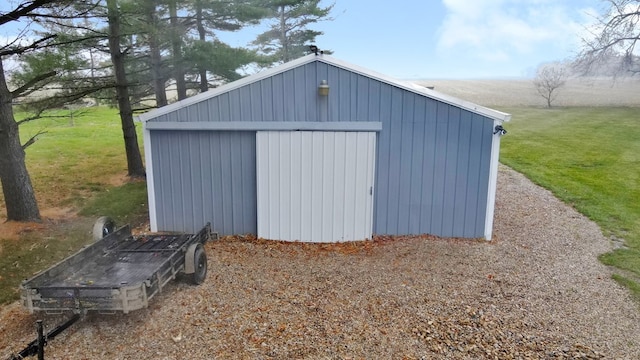 view of outdoor structure with a yard