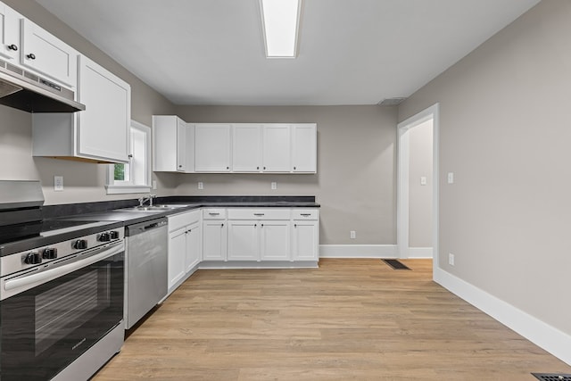 636 Callowhill St, Wooster, OH 44691 - kitchen featuring stainless steel appliances, under cabinet range hood, white cabinets, and light wood-style flooring