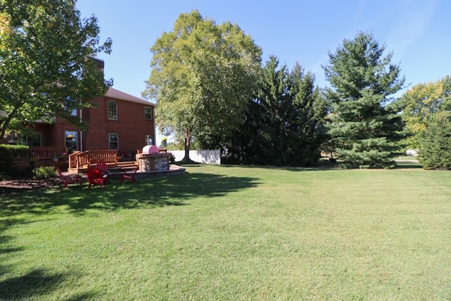 view of yard featuring a deck